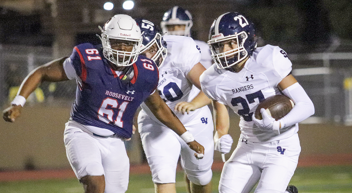 Junior running back Lincoln McKeon gets some playing time in the 45-0 season opener over Roosevelt. He had seven carries for 33 yards.